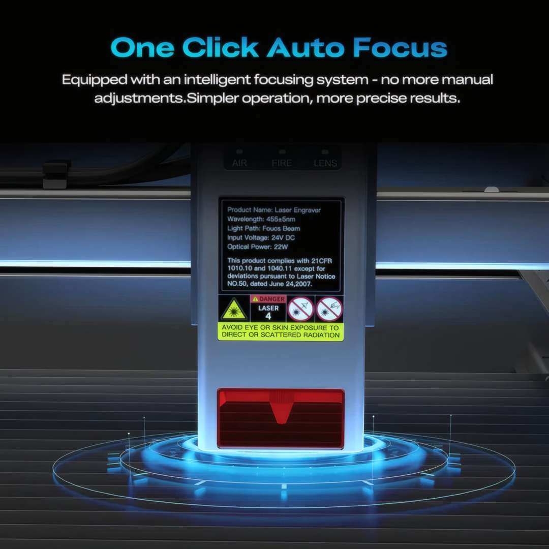 Primer plano del m�dulo l�ser del Creality Falcon2 Pro S 22W mostrando el sistema de autofoco inteligente con indicadores AIR, FIRE y LENS y etiqueta de seguridad l�ser FDA