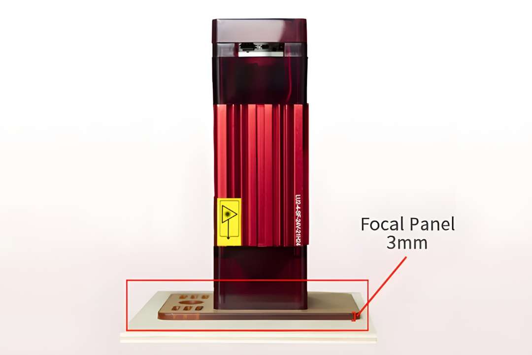 Ortur LU2-4-SF laser module with 3 mm Focal Panel gauge showing how to set the 30 mm focal distance on an engraving material
