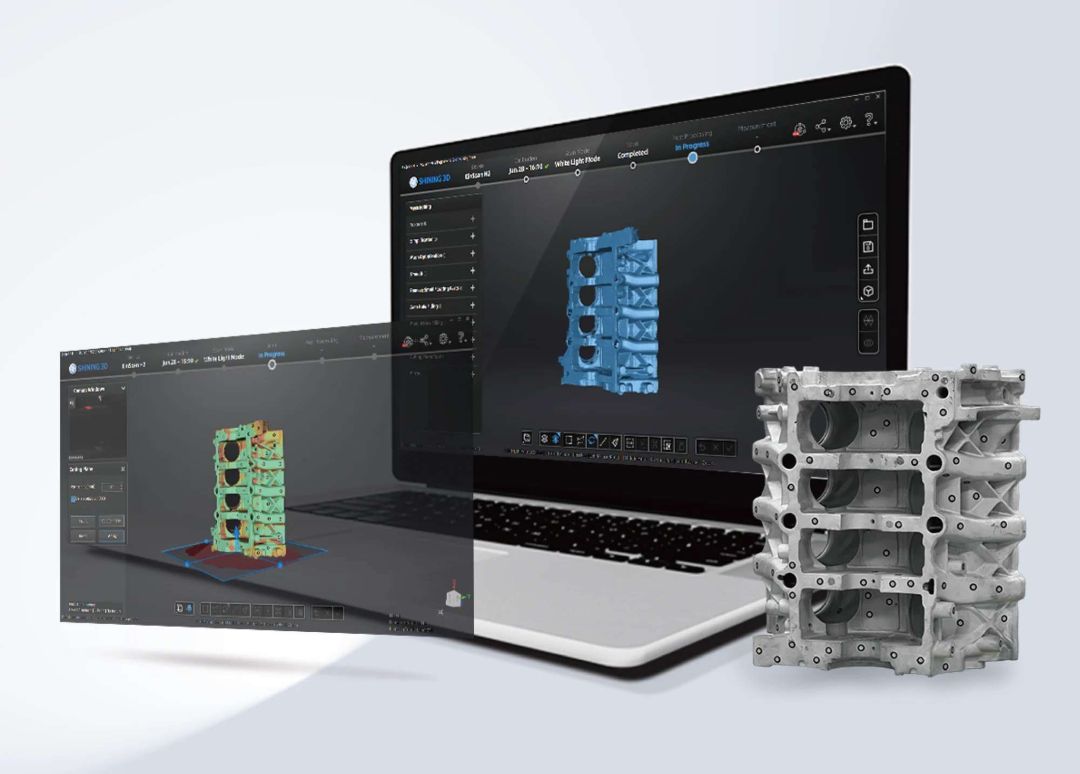 Un ordenador portátil muestra un software de escaneo 3D junto a un bloque de motor metálico industrial