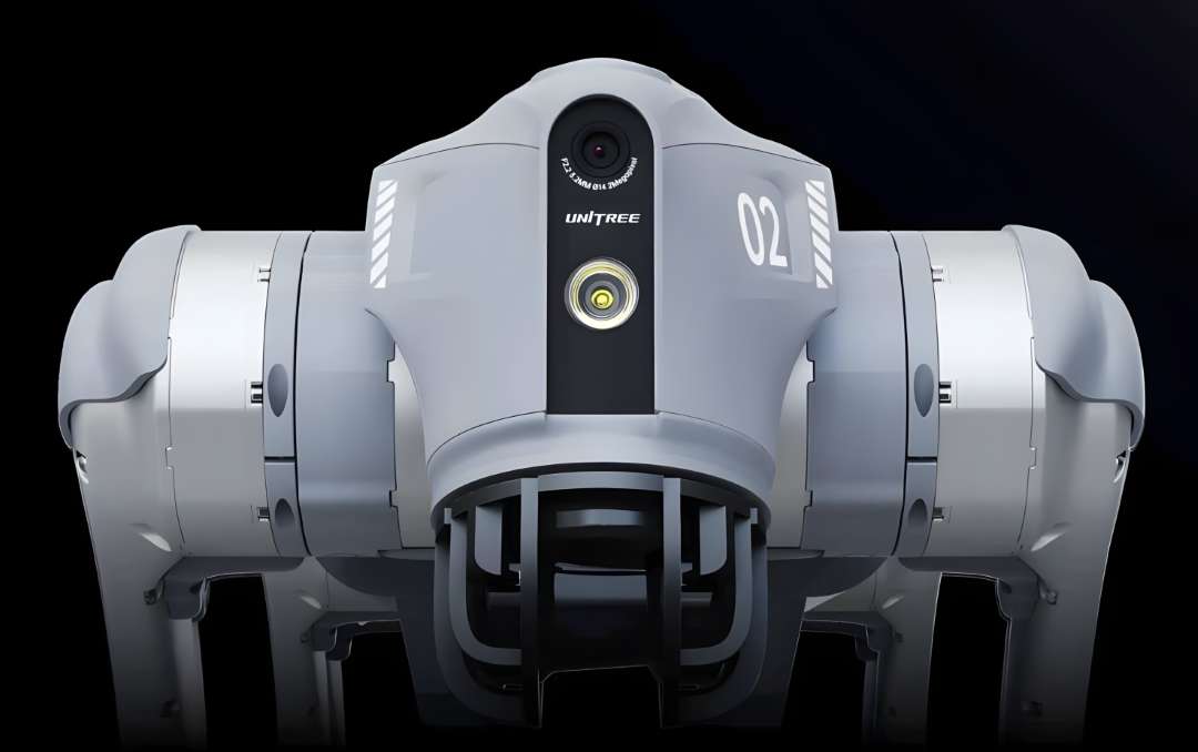 Vista frontal en primer plano del Unitree Go2 Air mostrando la cámara gran angular, la lámpara delantera y el alojamiento del sensor LiDAR sobre fondo oscuro
